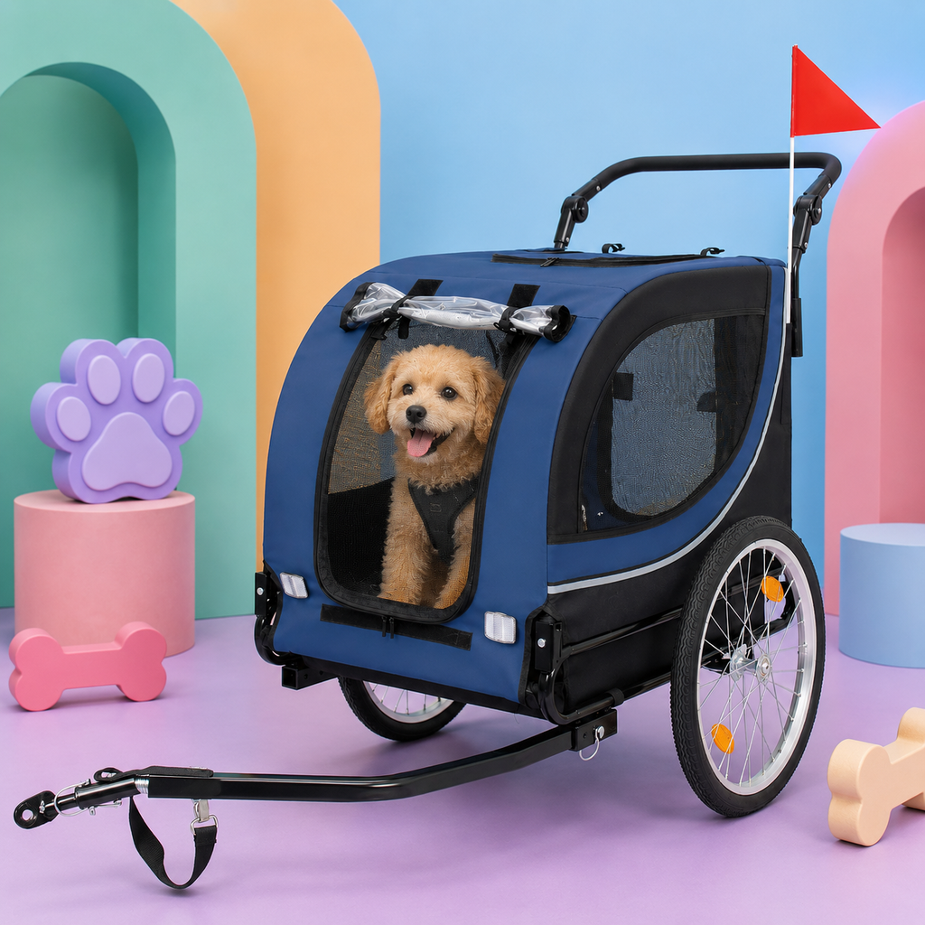 A blue and black pet stroller trailer with a small golden dog sitting inside, shown on a colorful pastel studio set with arches and dog-shaped props.