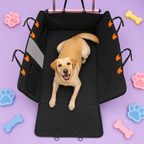 A yellow Labrador retriever lies inside a black padded dog crate with orange accents, set against a lavender background decorated with colorful bone and paw print shapes.